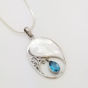 Ying Yang Mother of Pearl Blue Topaz Pendant